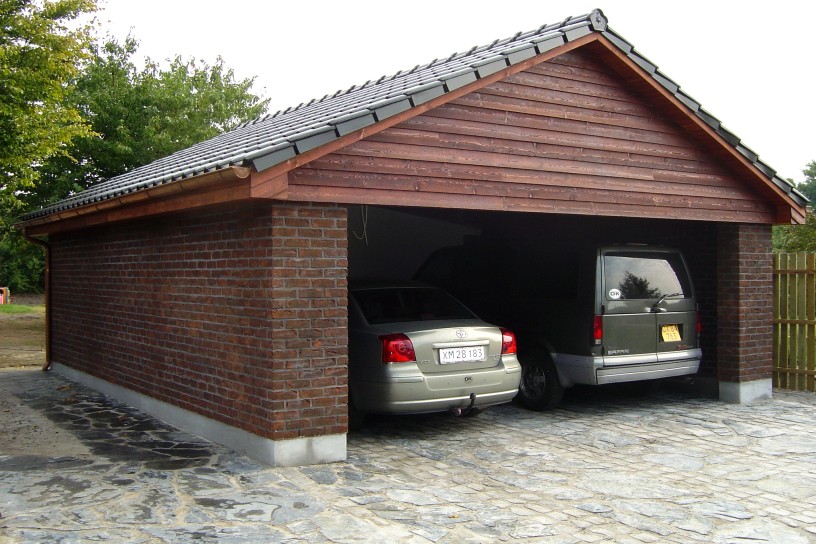 Zmiana pokrycia dachowego, ułożenie elewacji, kamienia, wzniesienie garażu